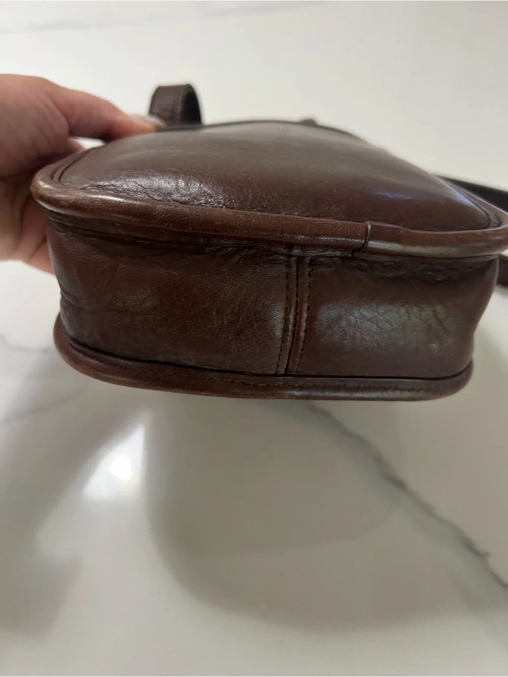 Vintage Coach Brown Leather Crossbody Bag with Gold Hardware.